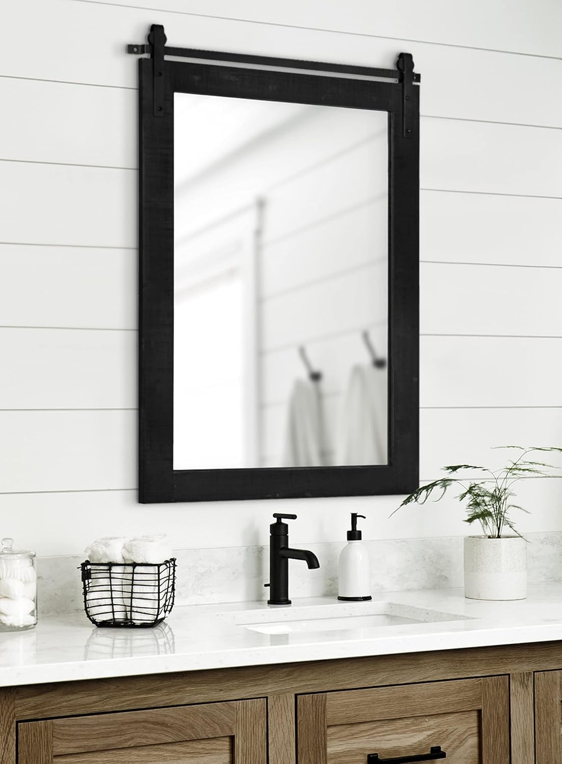 Kate and Laurel Cates Rustic Wall Mirror; 24 x 38; Black; Distressed Farmhouse Wall Decor with Rolling Barn Door Design