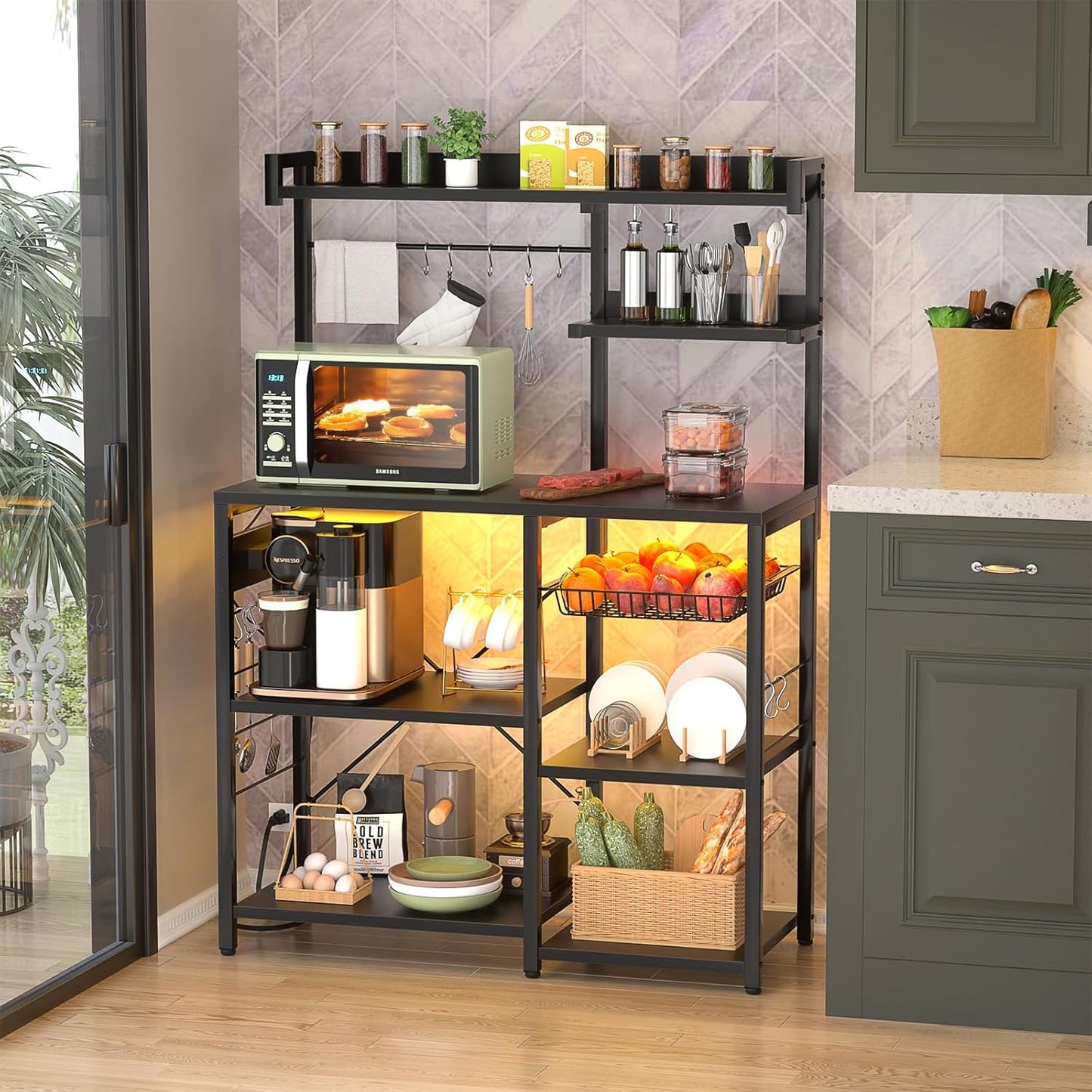 Aheaplus Bakers Rack with Power Outlet and LED Light Strings, Microwave Oven Stand Kitchen Storage Shelf with Wire Basket, Coffee Bar Station Island Table with 10 Hooks for Spices, Pots, Pans, Black