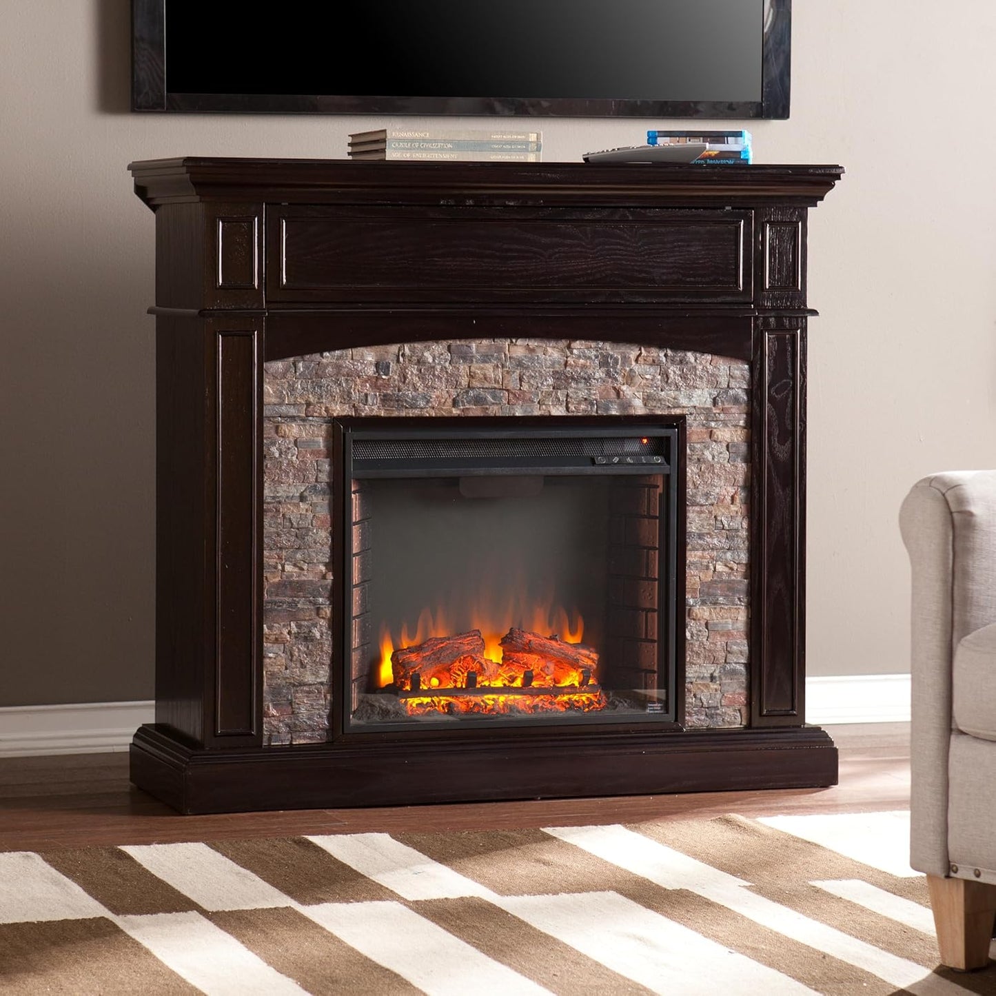 SEI FURNITURE Grantham Faux Stone Corner Electric Media Fireplace, Ebony Finish.