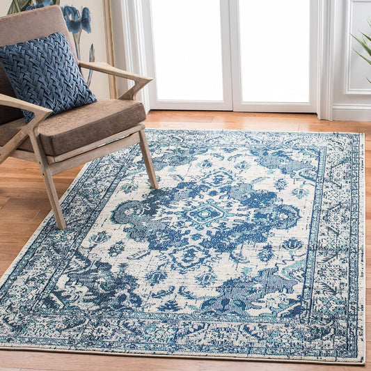 SAFAVIEH Monaco Collection Area Rug - 9' x 12', Ivory & Blue, Boho Chic Medallion Distressed Design, Non-Shedding & Easy Care, Ideal for High Traffic Areas in Living Room, Bedroom (MNC243A)